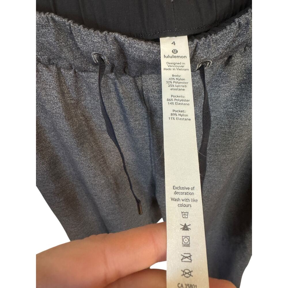 LULULEMON On The Fly Pant (28") Heathered Black Size 4 Pockets Athleisure Travel - Picture 3 of 9